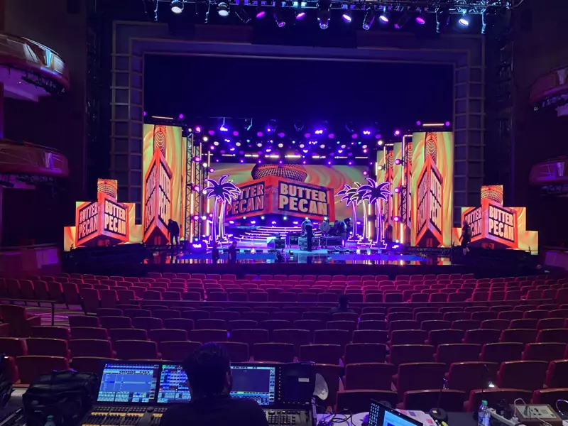 Arena stage framed by LED video walls